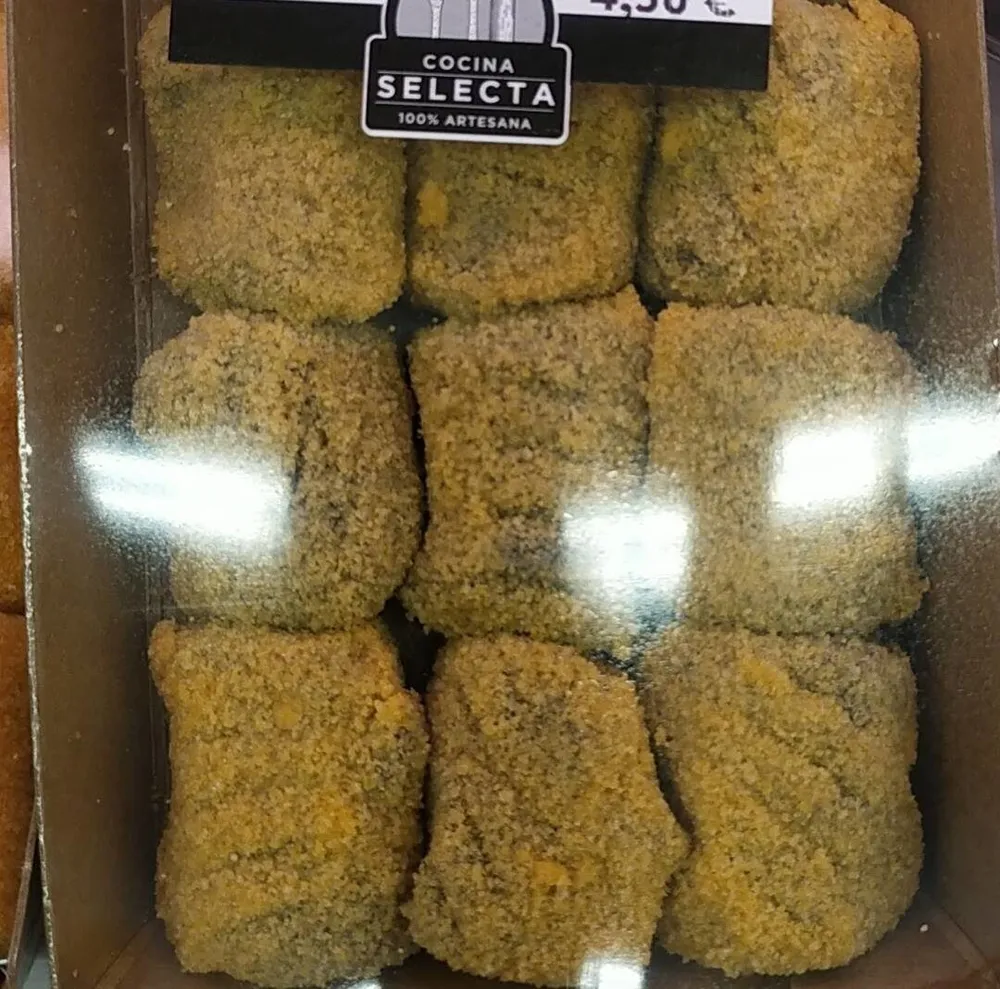 Croqueta chipiron en su tinta