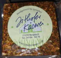 Jithofer Ofen- und Kräuterkäse mit rosa Pfeffer
