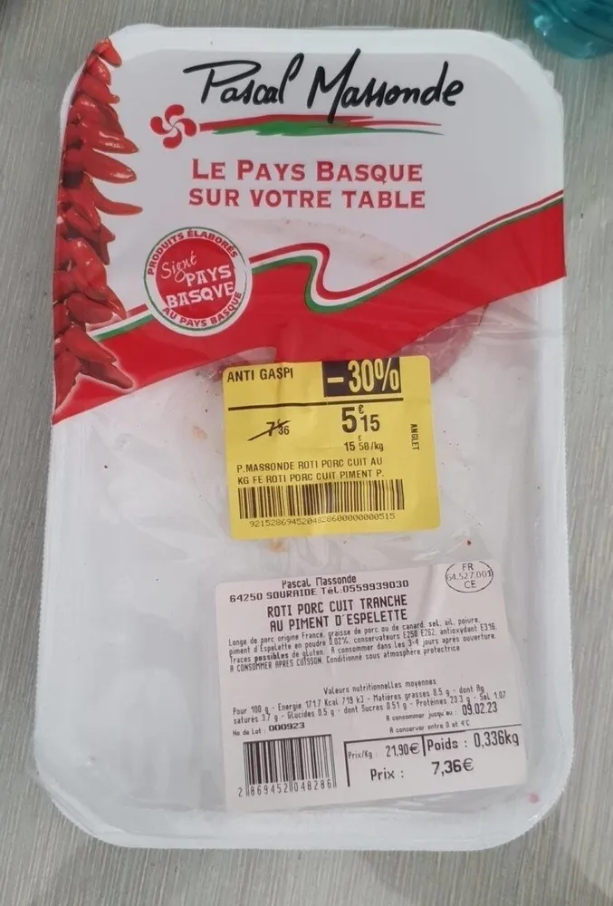 Rôti porc cuit tranché au piment d'espelette