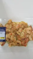 QUEUES DE CREVETTES PARTIELLEMENT DÉCORTIQUÉES CUITES MARINÉES