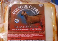 Queso de cabra semicurado untado con pimentón