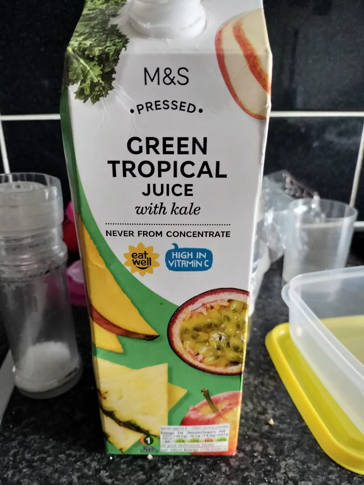 pressed green tropical juice with kale