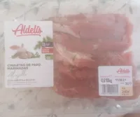 Chuletas de pavo marinadas al ajillo