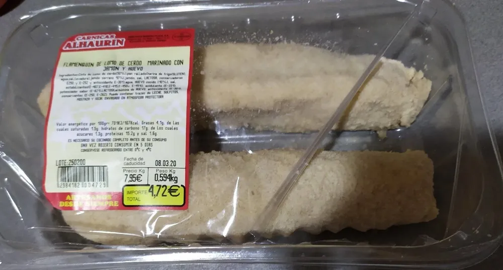 Flamenquín de lomo de cerdo marinado con jamón y huevo