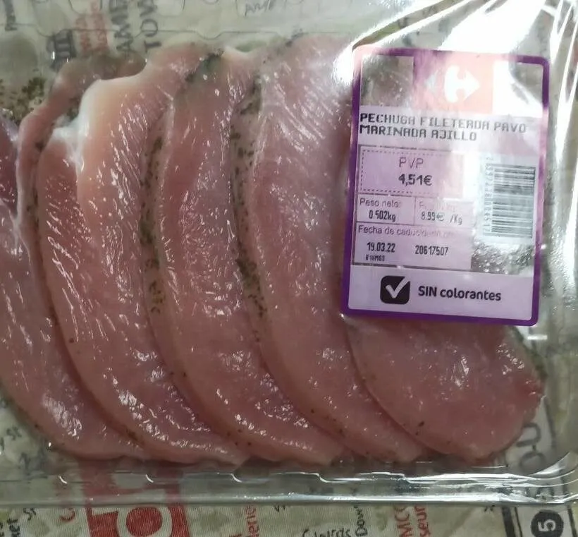 Pechuga fileteada pavo marinada ajillo