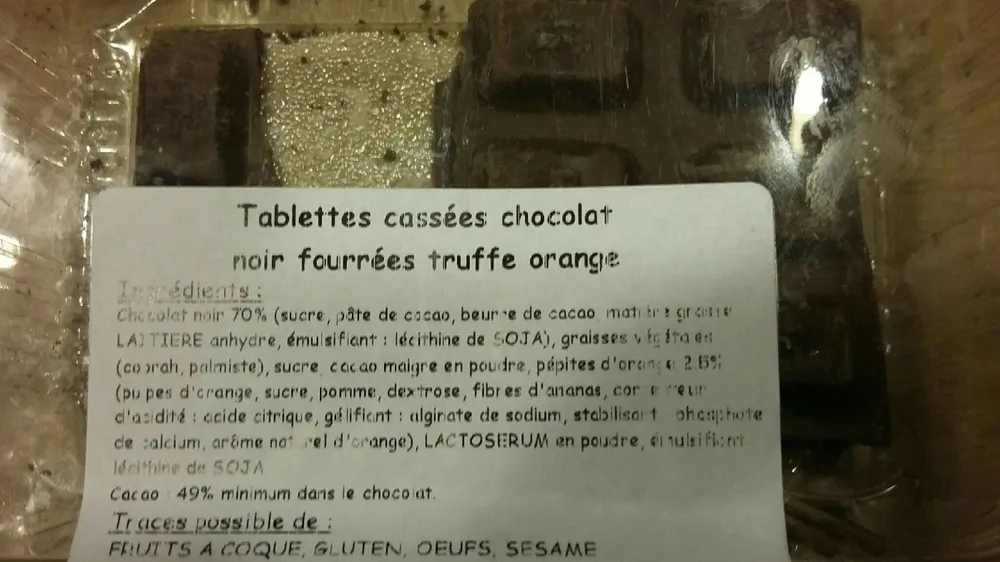 Tablettes cassées chocolat noir fourrées truffe orange