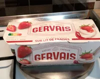 Yaourt onctueux sur lit de fraises