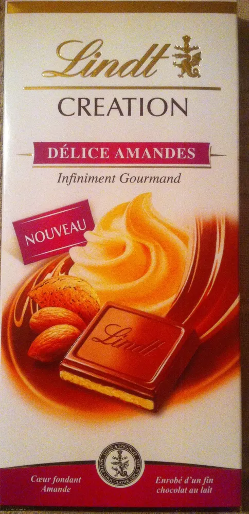 Création - Chocolat au lait, cœur de truffe à la poudre d'amande