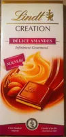 Création - Chocolat au lait, cœur de truffe à la poudre d'amande