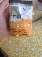 Nougat enrobé de chocolat lait-orange