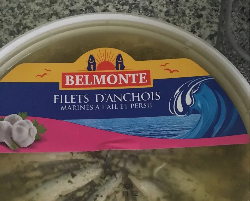 Filets d'anchois marines a l'ail et persil