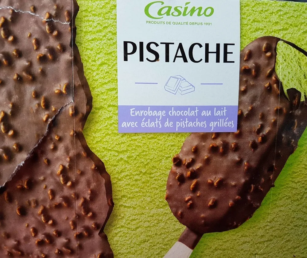 Pistache Enrobage chocolat au lait avec éclats de pistache grillées