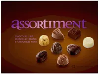 Assortiment de chocolats au lait blanc noir