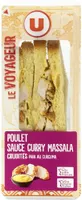 Sandwich au pain de mie spécial indien garni de filet de poulet traitéen salaison, d'une sauce au curry et de crudités