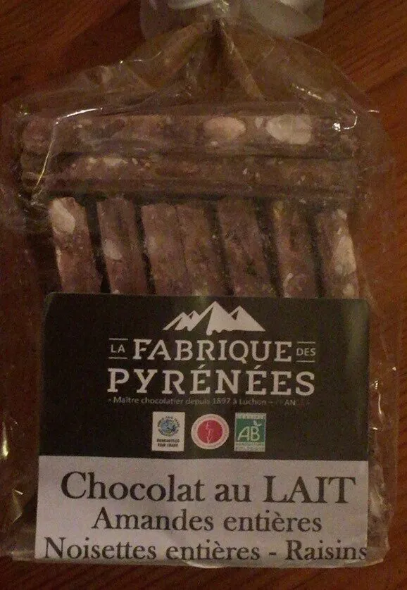 Chocolat au Lait -Amandes entiere- Noisettes entieres- Raisins