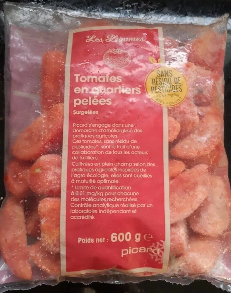 Tomates en quartiers pelées