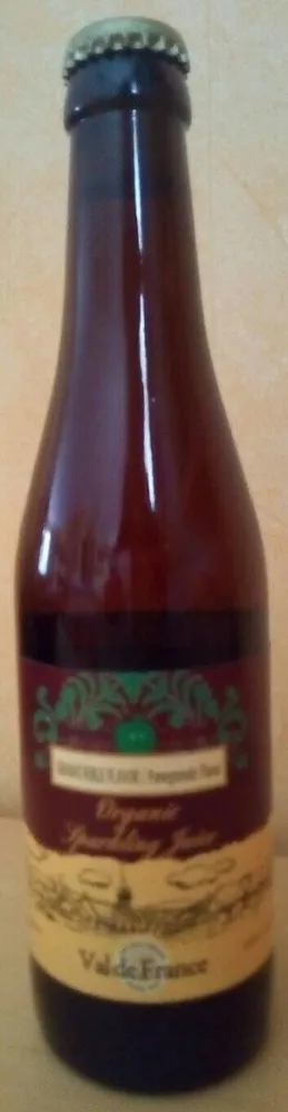 Jus pétillant de pomme et grenade