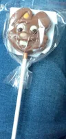 Sucette de chocolat au lait décoré