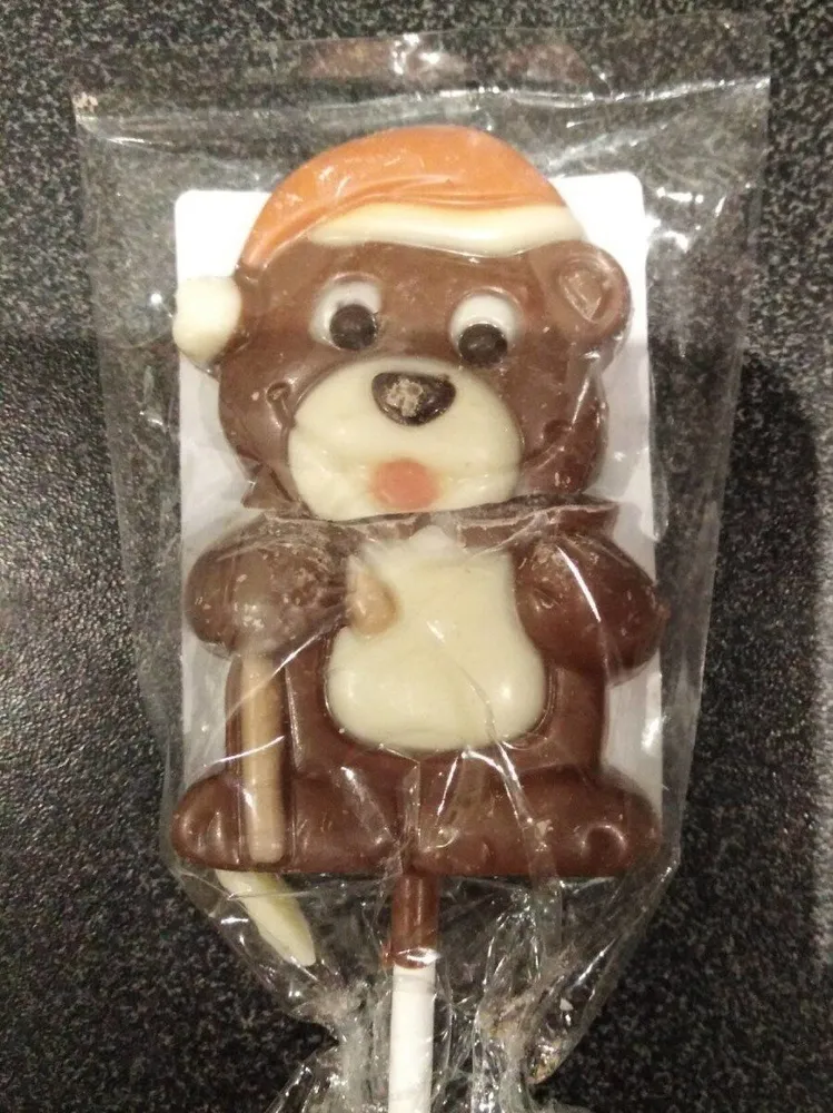 Sucette de chocolat au lait décoré