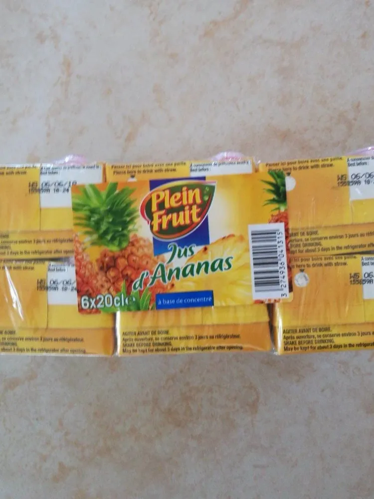 Jus d'ananas à base de concentré.