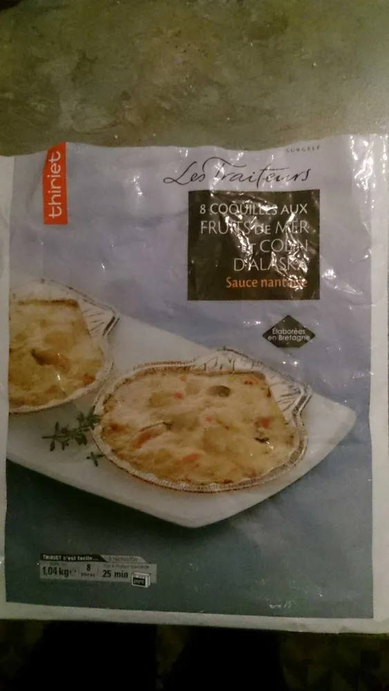 8 coquilles aux fruits de mer et Colin d'Alaska sauce nantaise