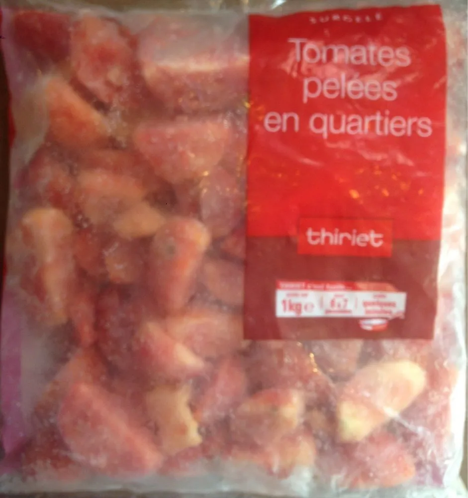 Tomates pelées en quartiers