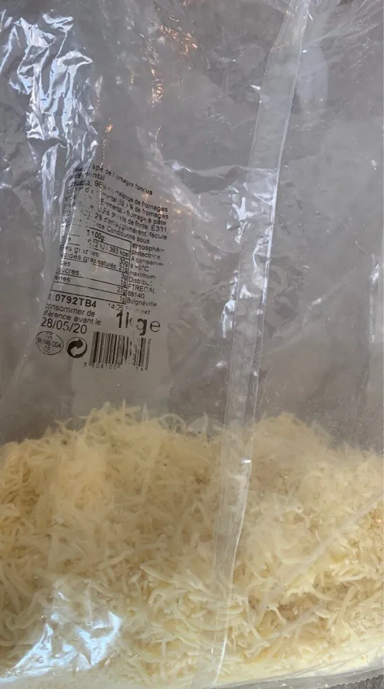 Mélange rappé de fromages fondus et d'emmental