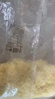 Mélange rappé de fromages fondus et d'emmental