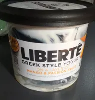 Greek style yogurt on a layer of mango and passion fruit
