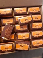 80 Chocolats NOIR ORANGE au nougat de Montélimar tendre