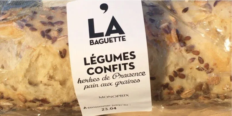 Sandwich au pain special aux graines garni de legumes confits