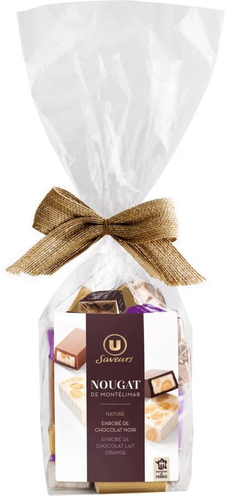 Assortiment de Nougat de Montélimar : nature, enrobés de chocolat noir, chocolat au lait aromatisé à l'orange Saveurs