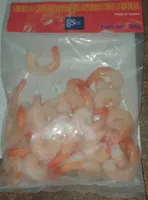 Queues de crevettes décortiquées deveiné cuites congeléeses