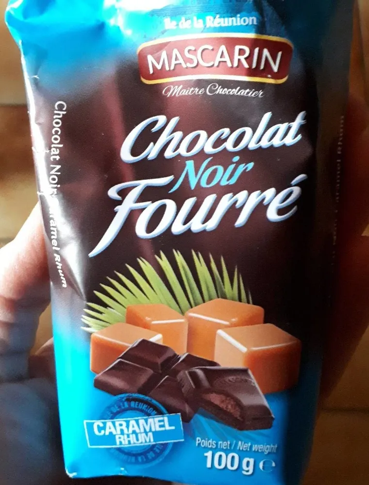 Chocolat noir fourré caramel rhum