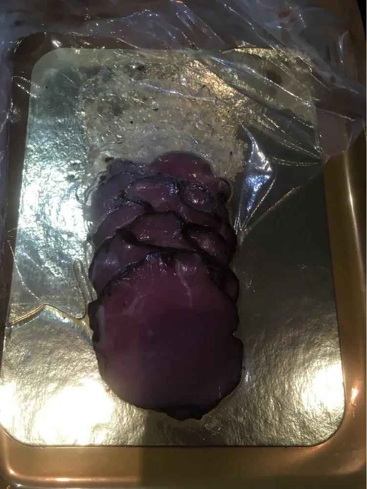 Filet mignon de porc traite en salaison fumé aux herbes