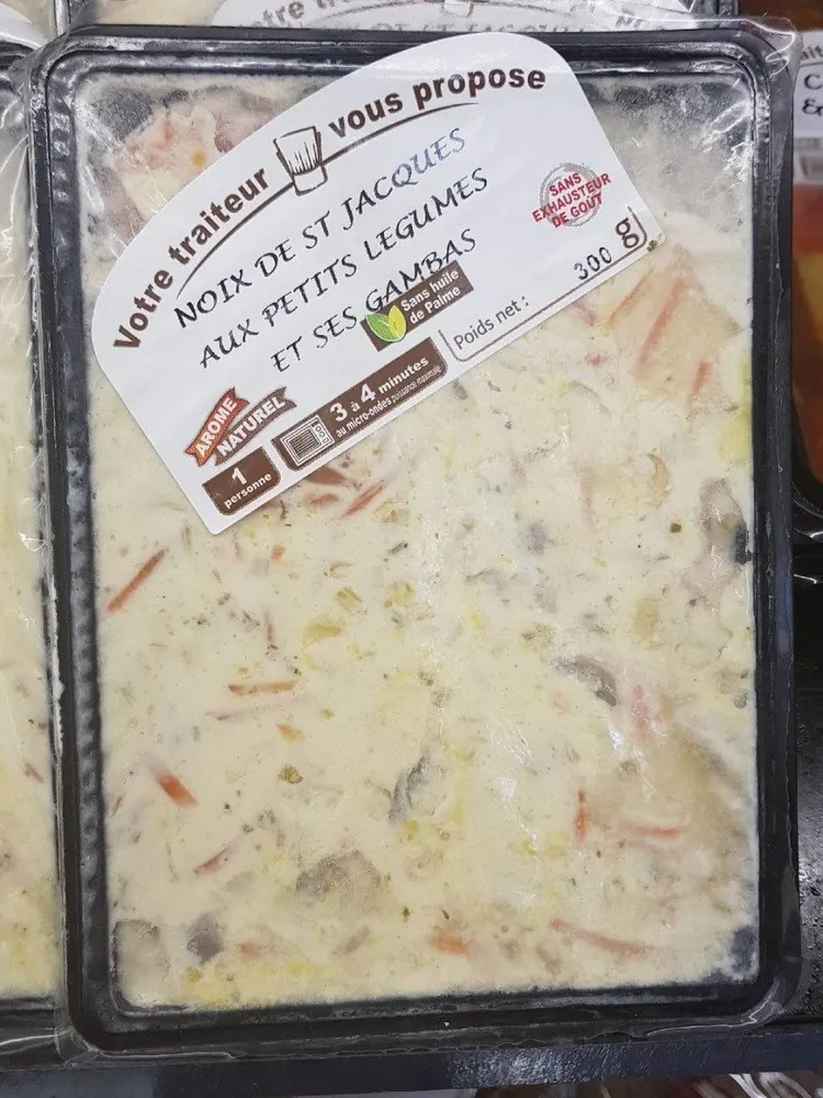 Noix de st jacques aux petits légumes et ses gambas