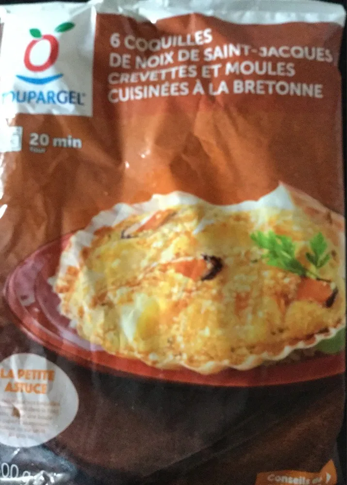 Coquilles de noix de st jacques, crevettes et moules cuisinées à la bretonne