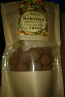 Noisettes enrobées de chocolat lait et cacao