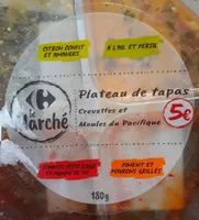 Plateau de tapas Crevettes et Moules du Pacifique Citron confit et amandes A l'ail et persil Façon pesto rouge et tomates Piment et poivrons grillés