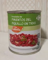 Ensalada de pimientos del piquillo en tiras con cebolla