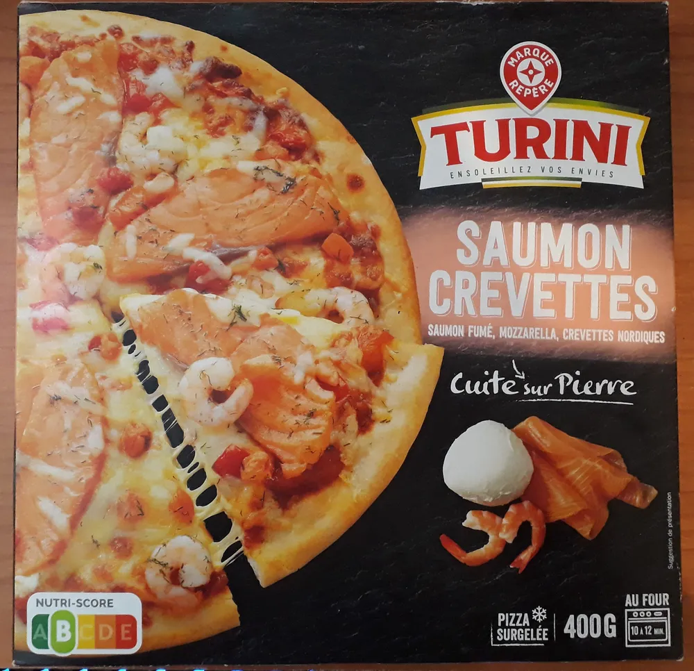 Pizza saumon crevette cuite sur pierre