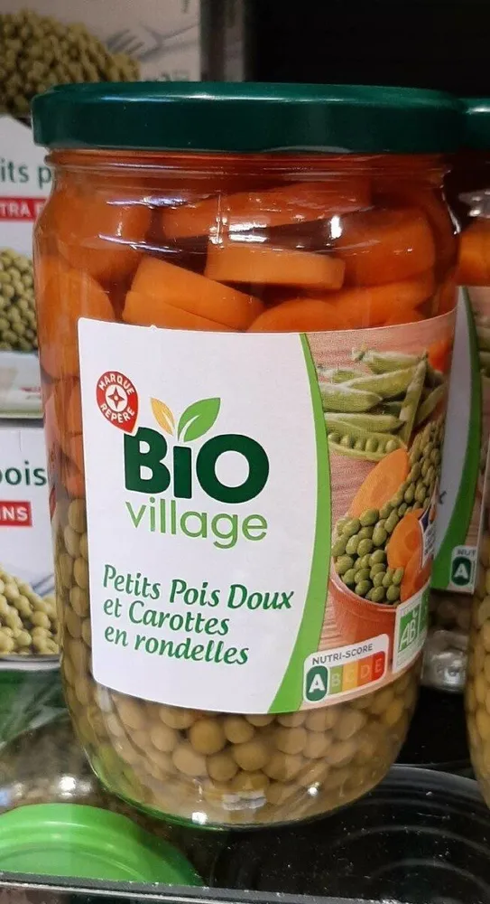 Petits pois doux et carottes en rondelles