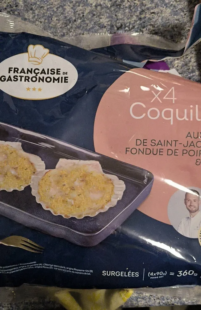 Coquilles aux noix de Saint-Jacques, fondue de poireaux & yuzu