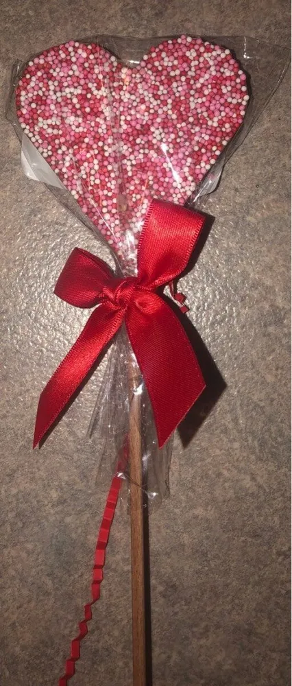 Sucette coeur en chocolat au lait
