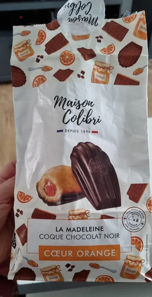 La madeleine coque chocolat noir, cœur orange