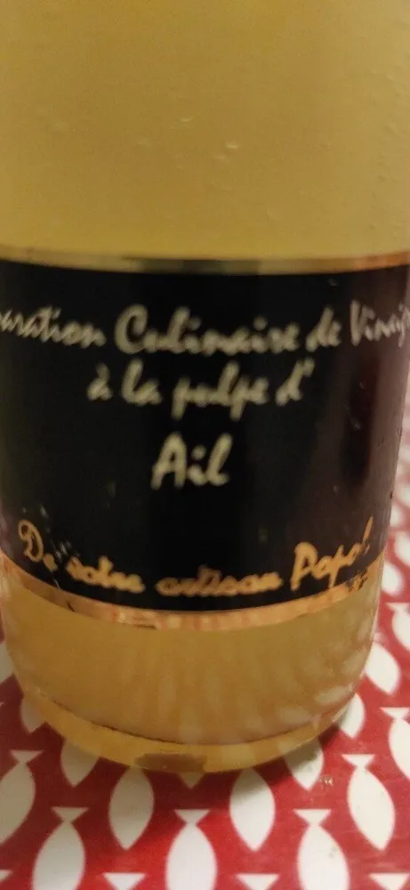 Préparation culinaire de vinaigre a la pulpe d'ail