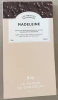 MADELEINE CHOCOLAT NOIR SUR CHOCOLAT AU LAIT AUX ÉCLATS DE NOISETTES