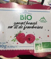 Yaourt brassé sur lit de framboises