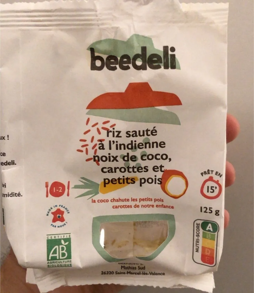 Riz sauté a l’indienne noix de coco, carottes et petits pois