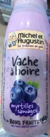 Vache à boire myrtilles sauvages